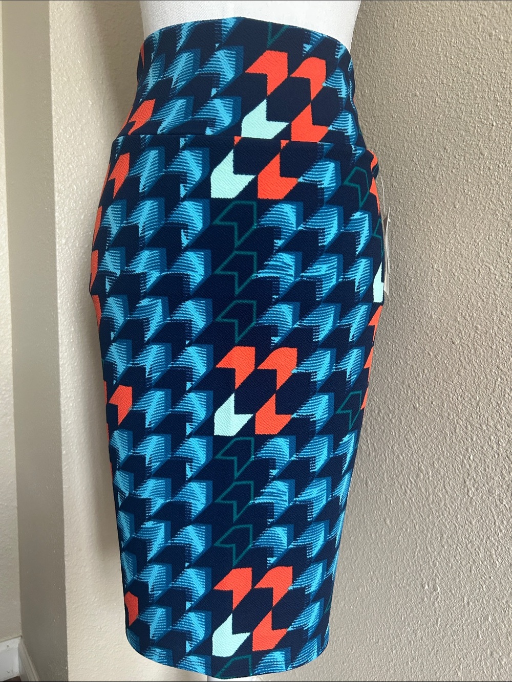 LuLaRoe Navy Pencil Skirt with Teal, Light Blue and Coral Geometric Print